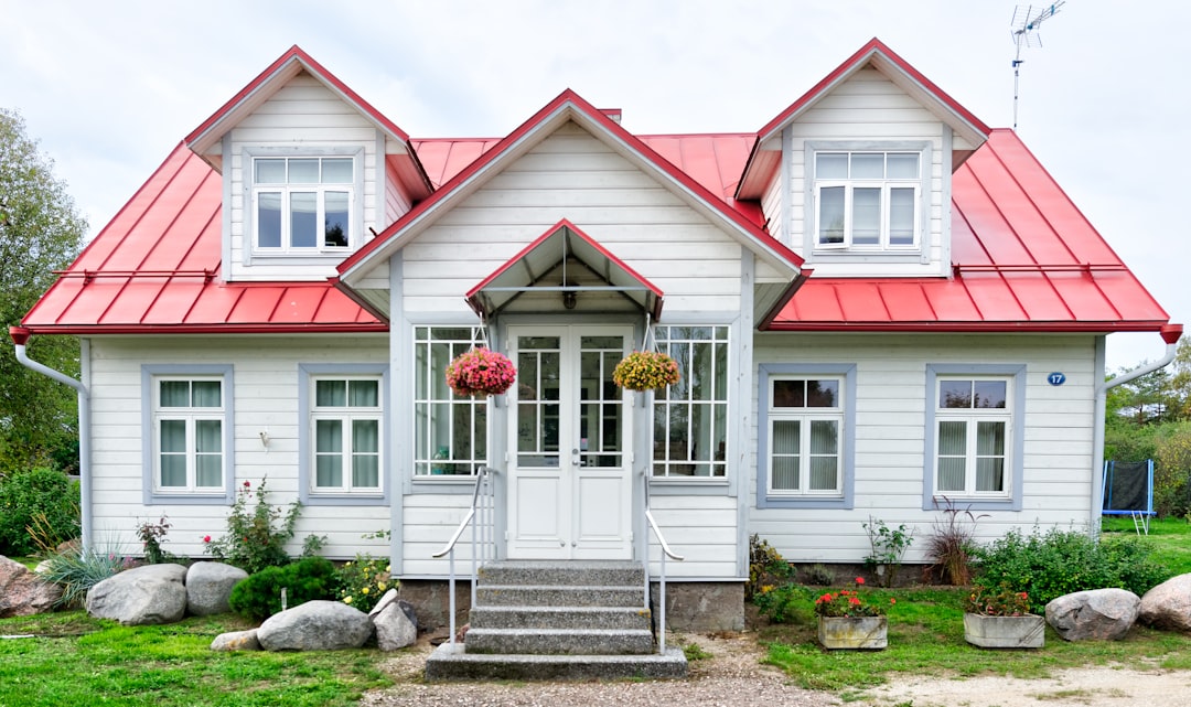 A young couple reviewing documents at home – how to find the best home loan options for low-income families.